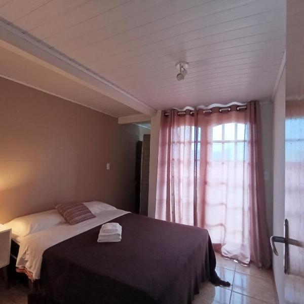 Hospedagem Doce Lar Casa Violeta - Foto 2