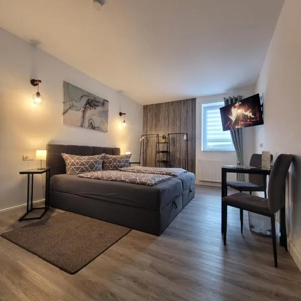 Airbnb, Doppelzimmer, direkt an der A2 & A14, 24 Stunden Check-In, Parkplatz, ruhig، فندق في Dahlenwarsleben