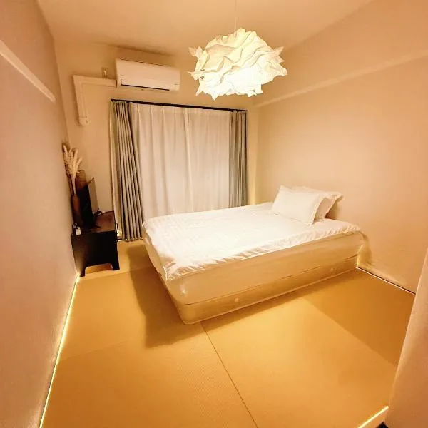 和605 名駅徒歩圏 地下鉄徒歩3分 最大4名 洗面台 浴室 トイレ別 長期滞在可乾燥機付き, מלון בנגויה