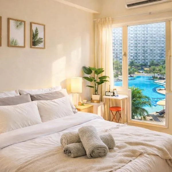 633 Air Condo Pool View Escape Cozy 1BR w Sofa Bed, hotel u Malini