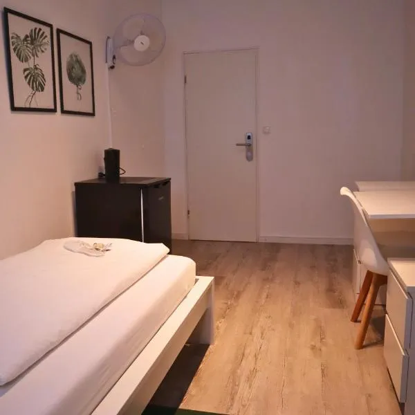 D10 I shared bathrooms&kitchen, hotel i Garching bei München