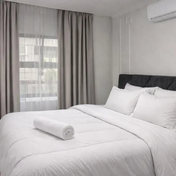 SouthSide Apartment، فندق في غابورون