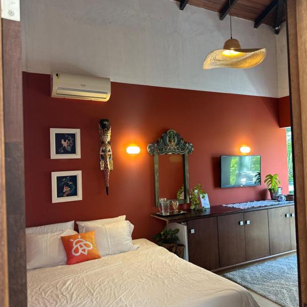 Quarto em casa de praia com estacionamento