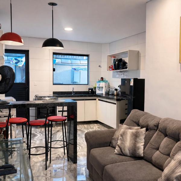 Casa completa a 200m da Praia da Ocian com Ar-condicionado, Wi-Fi, quintal e churrasqueira