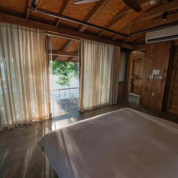 Trị An Retreat- TRI AN RETREAT، فندق في Ðịnh Quán