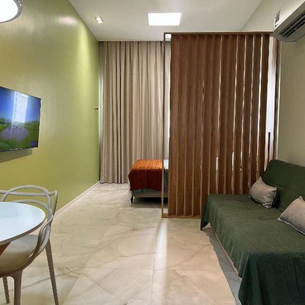 Studio moderno no Centro com piscina rooftop