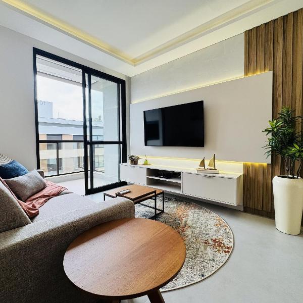 Oásis do Atlântico 303 A - Apartamento elegante na Praia de Palmas, em um condomínio clube completo.