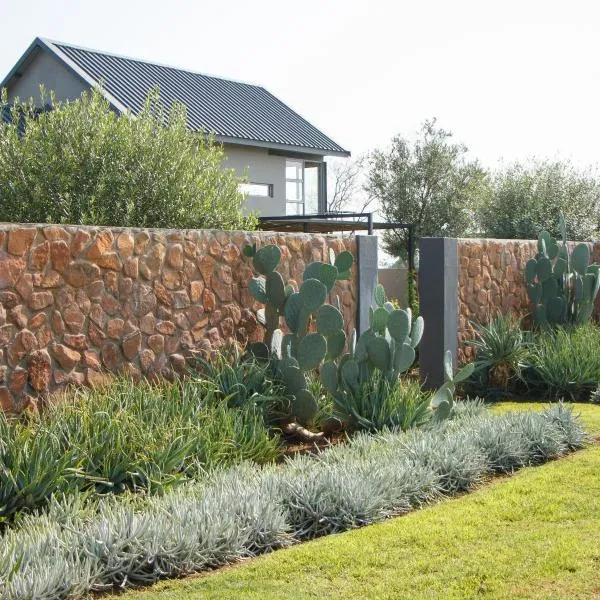 Stroomrivier Lodge, hotell i Boshoek