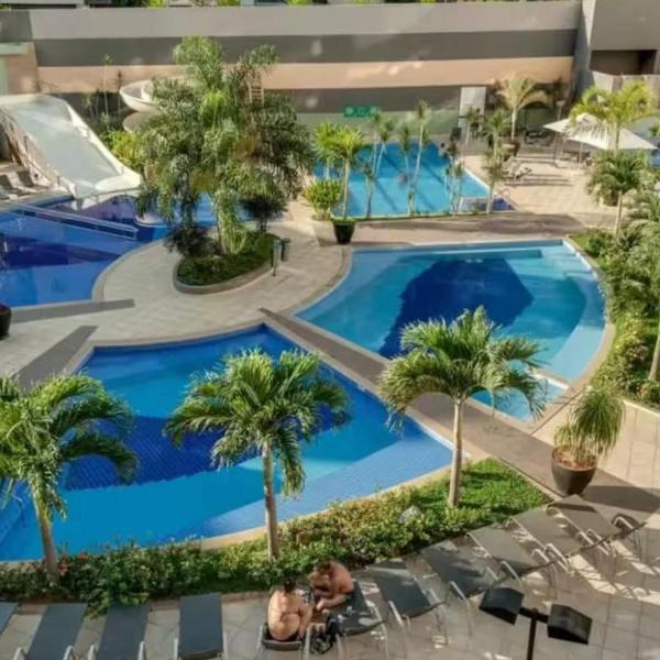 Flat veredas 300 metros HOT PARK Com ar na sala