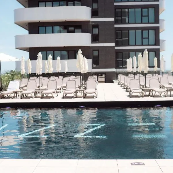 Green Serenity Apartment in Odyssey Pools Spa and Parking, Hotel in Mamaia Nord – Năvodari
