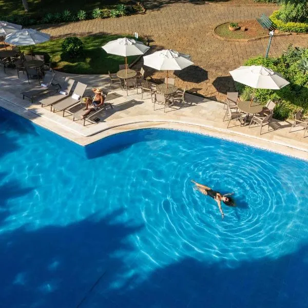 Grinbergs Village Hotel, готель у місті Сокорру