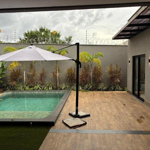 Casa com piscina, 3 suítes, 5 banheiros, área de lazer com churrasqueira, alto padrão, 500 metros do autódromo de Goiânia - Foto 4