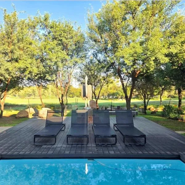 Casa Cara - Parys Golf Estate, хотел в Parys