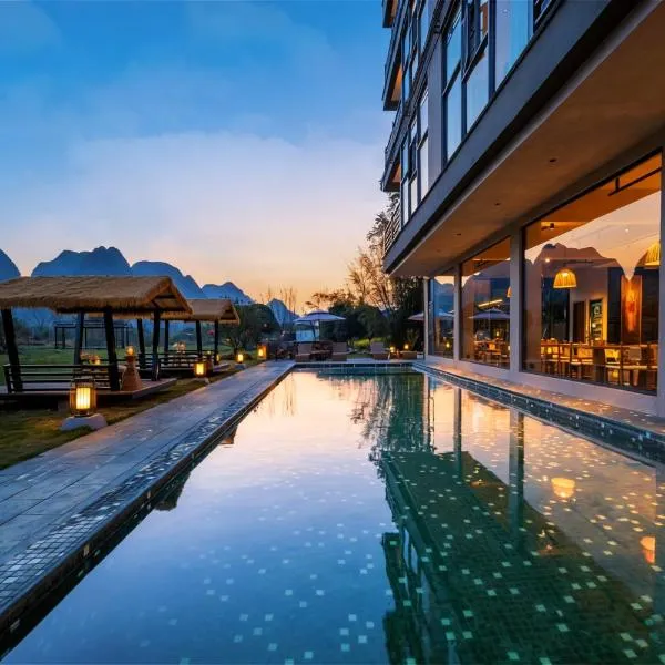 Yangshuo Afield Resort-3 minutes walk to Bamboo Rafting Wharf, Private Courtyard with grand lawn,Swimming pool,Free Self-Service Laundry & Drying,Attraction Tickets in Advance, Scooter& Trip planner, hotel a Yangshuo