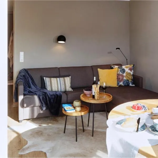 Antares Spiekerooger Gästehaus-Sonnengartenbalkon Süd mit Blick aufs Wattenmeer - Wohnung 7, Hotel in Spiekeroog