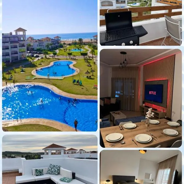 Beachfront Apartment in Assilah, Private Solarium, 4 Pools, Secure Residence, WiFi, Parking，艾西拉的飯店