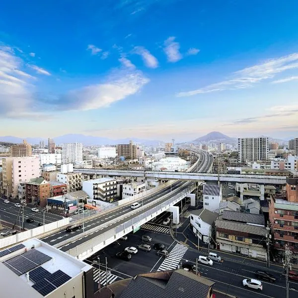 Socio Residential Hotel - ソシオ レジデンシャル ホテル، فندق في هيروشيما