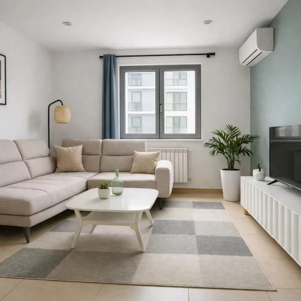 Joli appartement dans une résidence à Birkhadem, מלון בBirkhadem