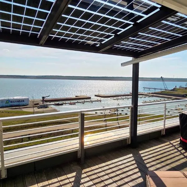 Penthouse Seebrise, готель у місті Гросрешен