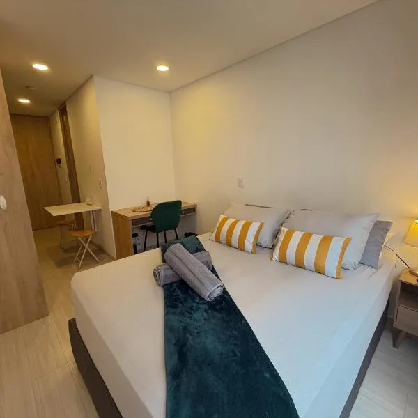 Loft premium con rooftop y piscina climatizada - Chapinero, Hotel in Bogotá