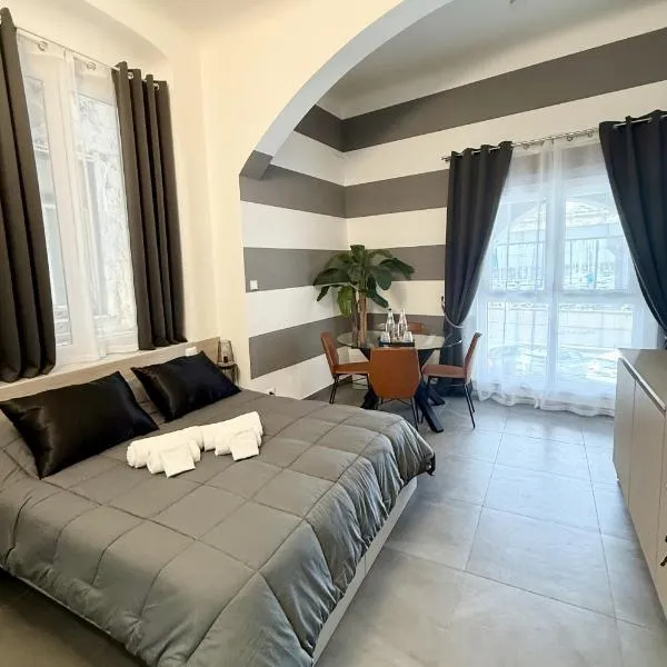 Suite degli Archi - Luxury Suites fronte Acquario con cucina, готель у Генуї