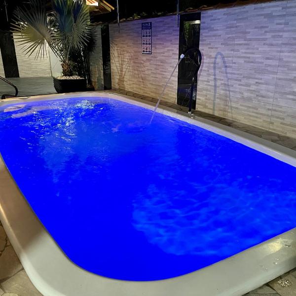 Casa com Piscina Hidro, área Gourmet, Próximo à praia