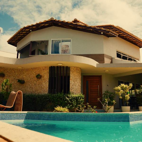 Casa 5 suites a 3 minuntos andando para o mar