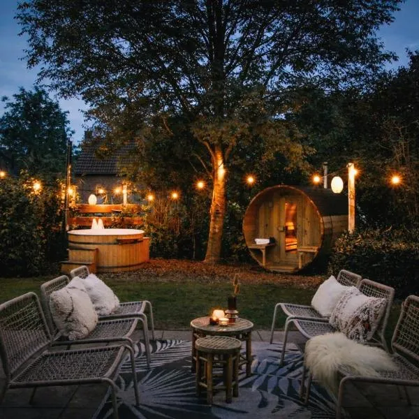 Bohemian Wellness met hottub & sauna, hotel din Ewijk