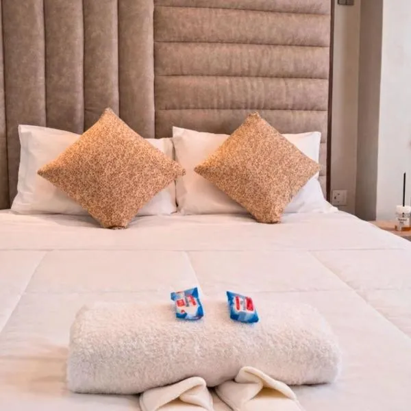 Serengeti Studio Apartments near Speke Resort with Housekeeping, Netflix, Wi-Fi, Airport Proximity, Hotel in Kampala