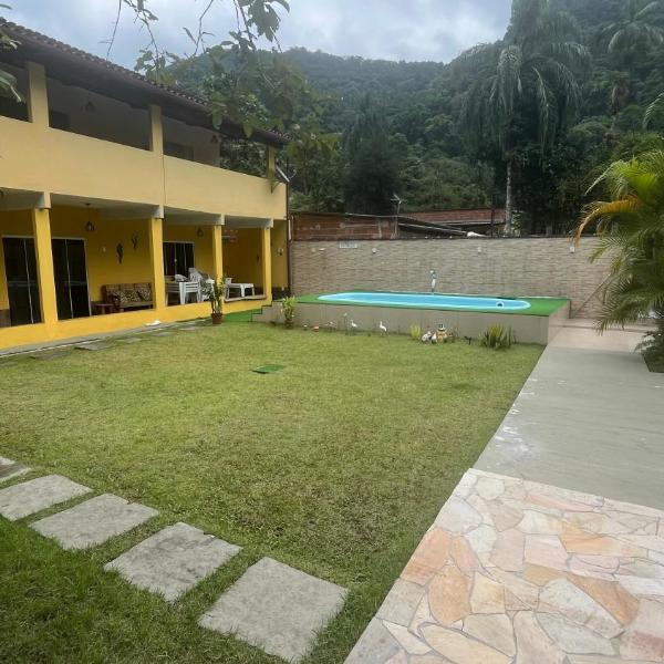 Casa com churrasqueira e piscina, perto de riacho - Foto 4