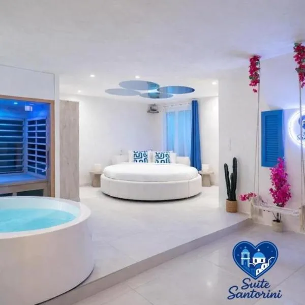 Suite romantique Santorini avec Balnéo & Sauna، فندق في بيزيناس