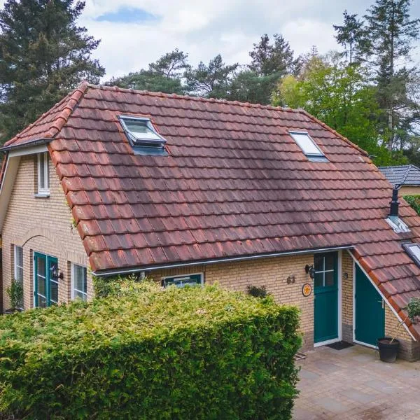 Luxe Veluws Vakantiehuis met JACUZZI, hotelli kohteessa Lunteren