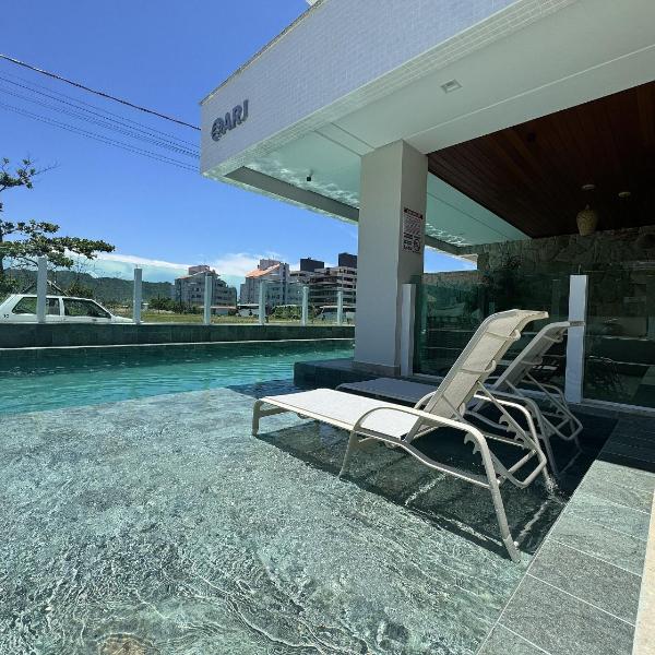 One Paraiso, apartamento com terraço a apenas 2 minutos do mar na Praia de Palmas. - Foto 4