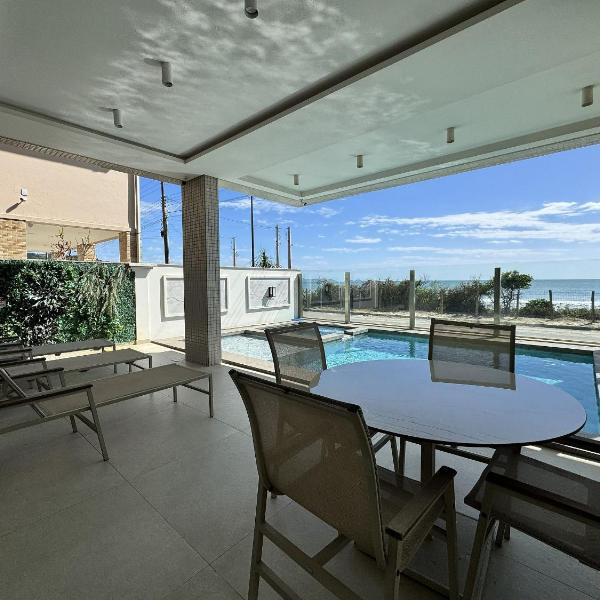Bellagio Home, apartamento de frente para o mar, com uma vista incrível para a Praia de Palmas