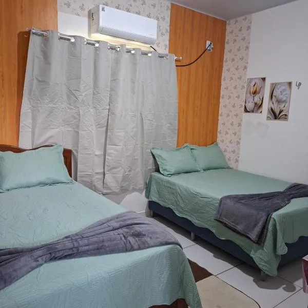 cantinho da Raq,um quarto SUÍTE com ar condicionado duas camas de casal perto doAeroporto, UEPA, Rodoviaria, magueirao, UFPA,parque ambiental,, hotel in Belém