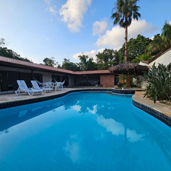 Casa Enorme em condominio, 4 suites, piscina com cascata, cozinha gourmet com churrasueira e fundo com pier no rio para práticas aquaticas - Foto 4