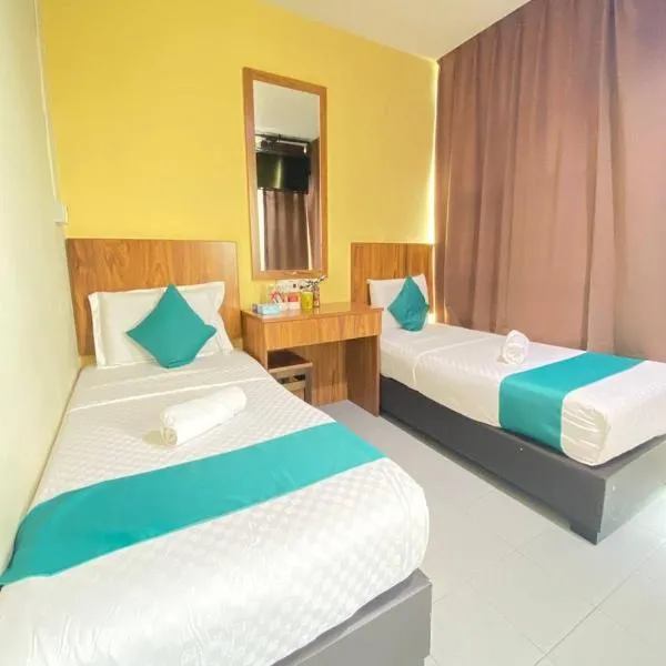 Sun Tree Hotel at Triang, hotel v destinácii Kampong Kerayong