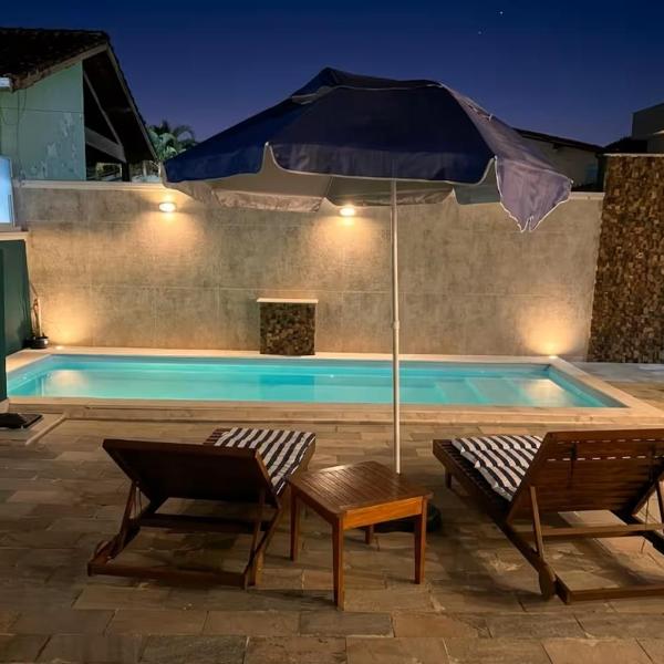 Casa NOVA com piscina privativa 500m da praia Pet Friendly