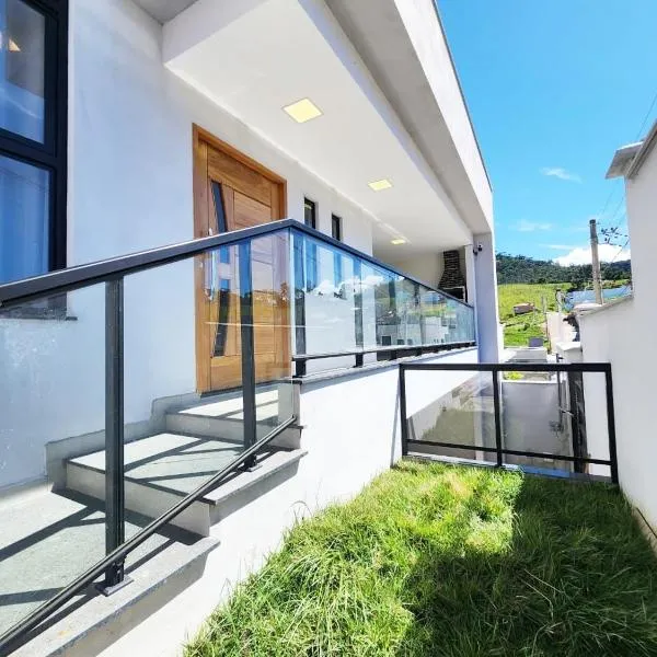 Casa para 4 pessoas I Churrasqueira I Garagem para 2 carros I 5min do centro, hotel in São Lourenço
