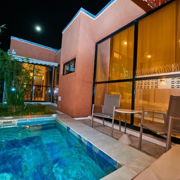 Résidence Akia - Jacuzzi privé & détente moderne, hôtel à Pointe-Noire