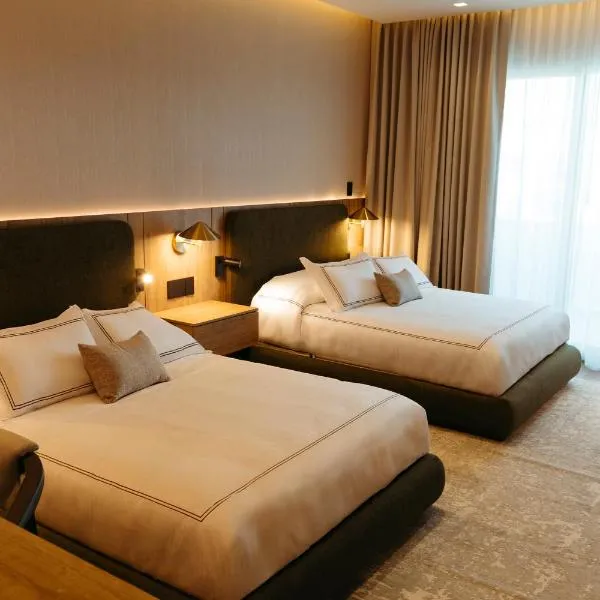 Hotel Core Suites Estadio Akron,薩波潘的飯店