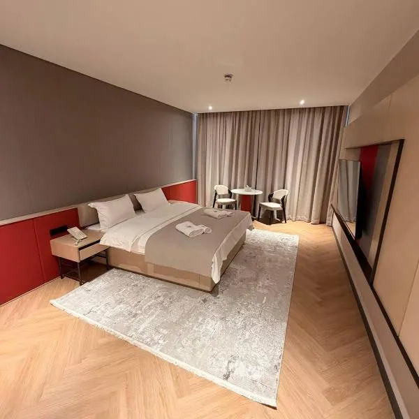AQMYRZA Inn، فندق في Zharkent