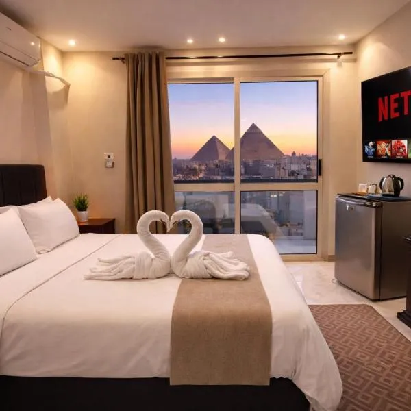 SuN roof pyramids view inn Jacuzzi stay & tours, Hotel in Kairo