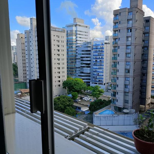 Quarto no apartamento do anfitrião na Praia do Canto