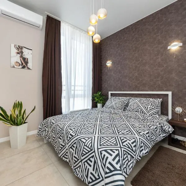 Апартаменты с панорамным видом в современном ЖК Seven на Осокорках, hotel a Kiev