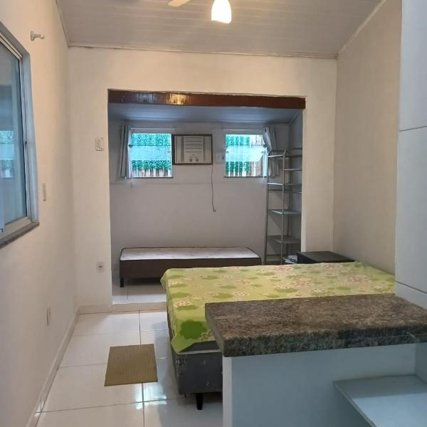 Casa inteira 4 pessoas, 2 quartos, suite ar, 2 banheiros, home office, estacionamento, próx praia Itaúna