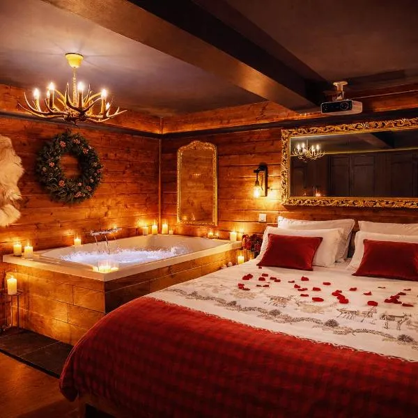 Le Chalet romantique, SPA XXL, 5 min centre ville, Écran cinéma, Lit king size, cascade d'eau, Hotel in Bourgoin-Jallieu