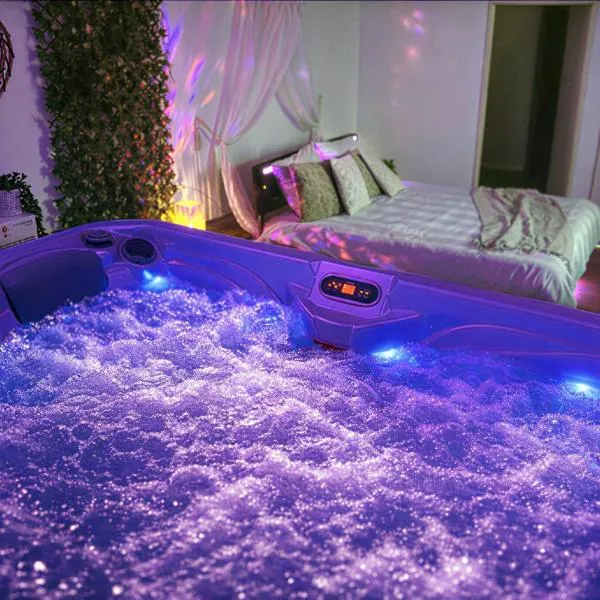 Jacuzzi privatif suite romantique à Dole, khách sạn ở Dole