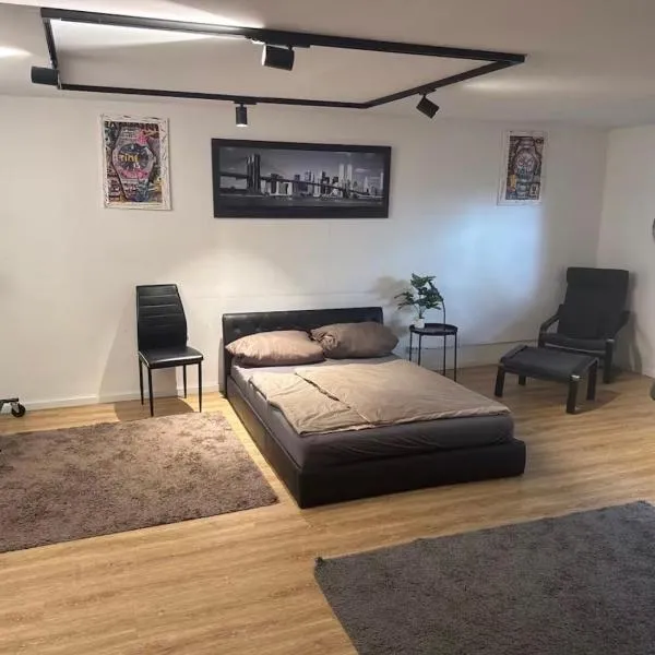 Ferienwohnung in der Nähe des Europa-Park Rust mit Terrasse und Grill, Hotel in Wyhl