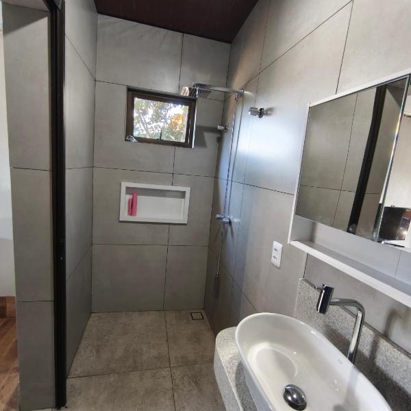 Quatro com suite e cozinha